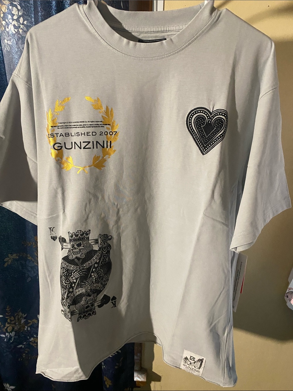 GunZini adult Light Gray Graphic Tee with Gold Laurel & Black Prints